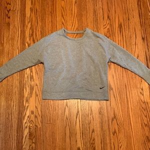 Size M dri-fit nike woman’s sweater.